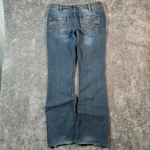 Vintage silver low rise glam slightly flared dark wash denim jeans